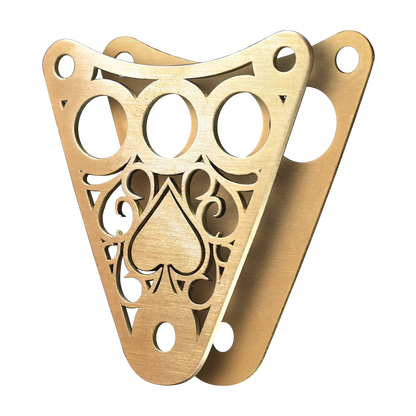 Isolated image of a decorative Kawasaki Vulcan 800 dash plaque made out of raw brass with front and back plaque separated.